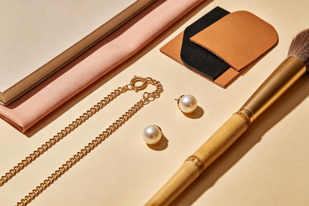 LONYARD craftsmanship materials — chains, pearls, leather and brush components